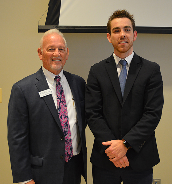 Bill Rhodes, professor at Augusta University, with Luke Eyrich, senior marketing student at the Hull College of Business.