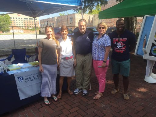 President Brooks Keel and First Lady Tammie Schalue at DCG booth at the Saturday Market
