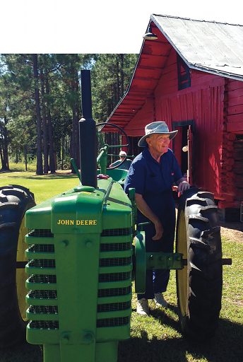 Dr. Roy Witherington on a farm