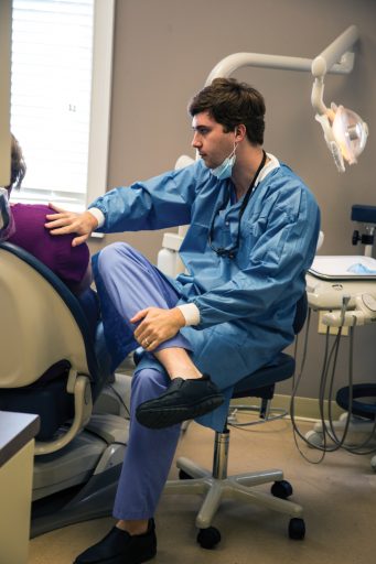 Dr. Grayson Griffis (‘15) is among those providing treatment at the Lloyd Darby Compassionate Care Dental Clinic.