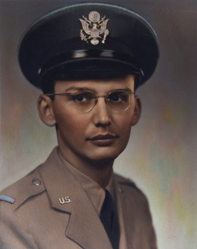 The solemn little boy grew up to be a slim, serious teenager sporting round  glasses and a neatly combed hairstyle, part of the class of ’44 at the new Gray High School.