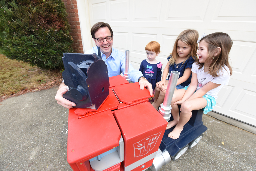 Kisting and daughters with Optimus Prime. Photo by Phil Jones.