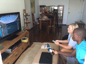 Pardon Ndhlovu and Brennan Meagher watch Olympic events Tuesday morning