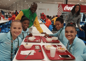 Pardon Ndhlovu meets U.S. gymnasts Simone Biles, Gabby Douglas, Madison Kocian and Laurie Hernandez. Courtesy of Pardon Ndhlovu.