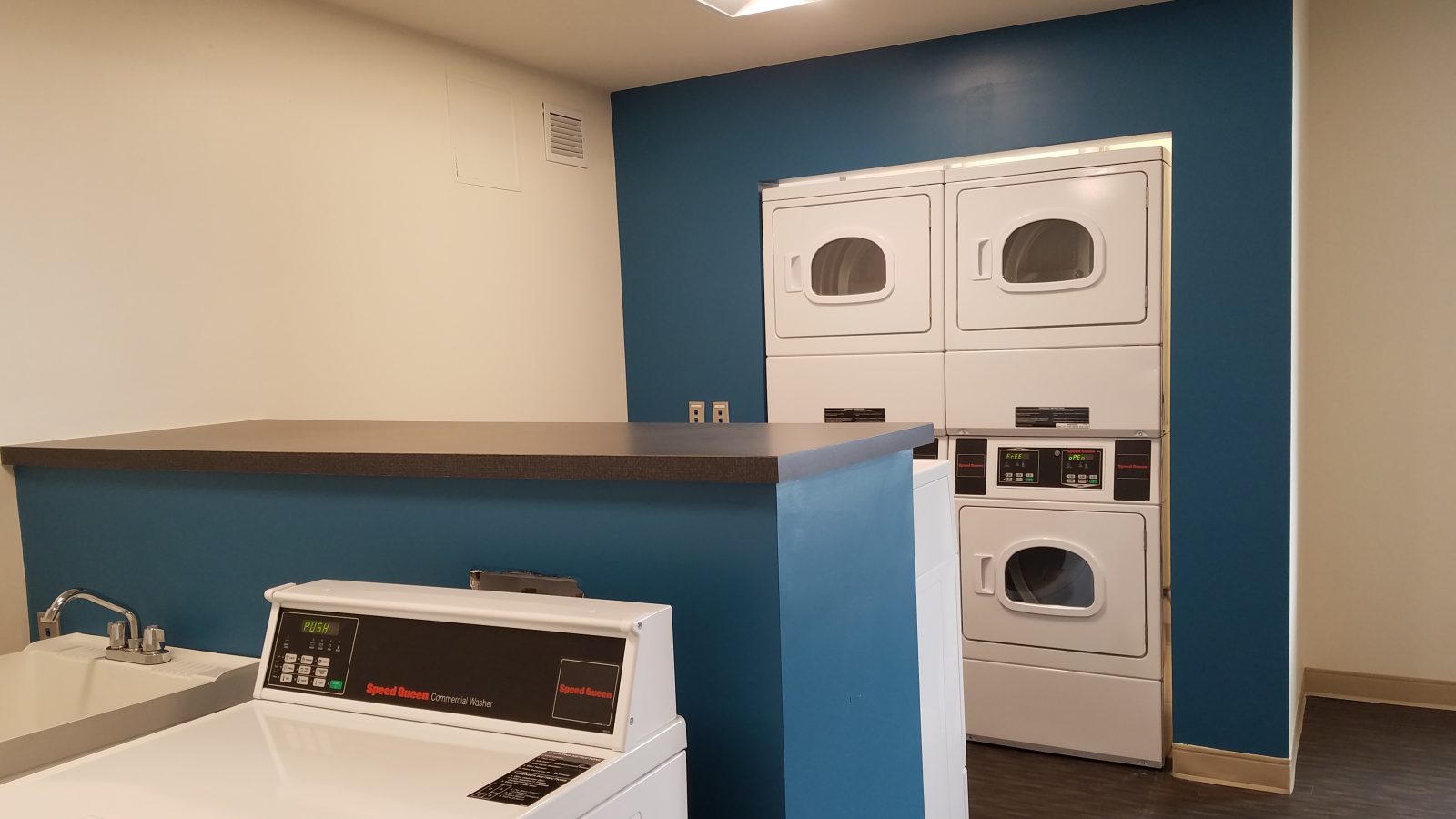 App-monitored units in the laundry room at Oak Hall