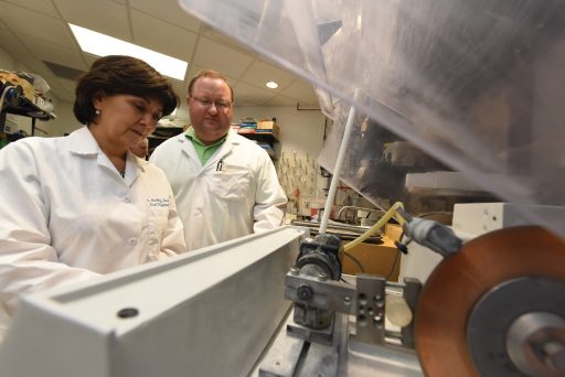 Dr. Martha Brackett and Travis Garrito, senior dental student.